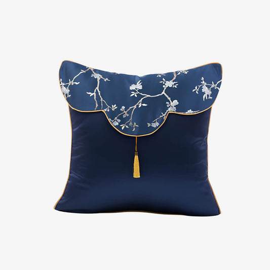 Coussin bleu à fleurs brodées