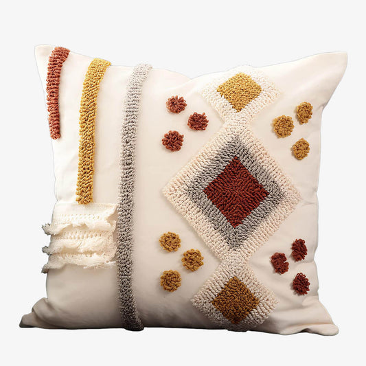 Coussin bohème tufté géométrique