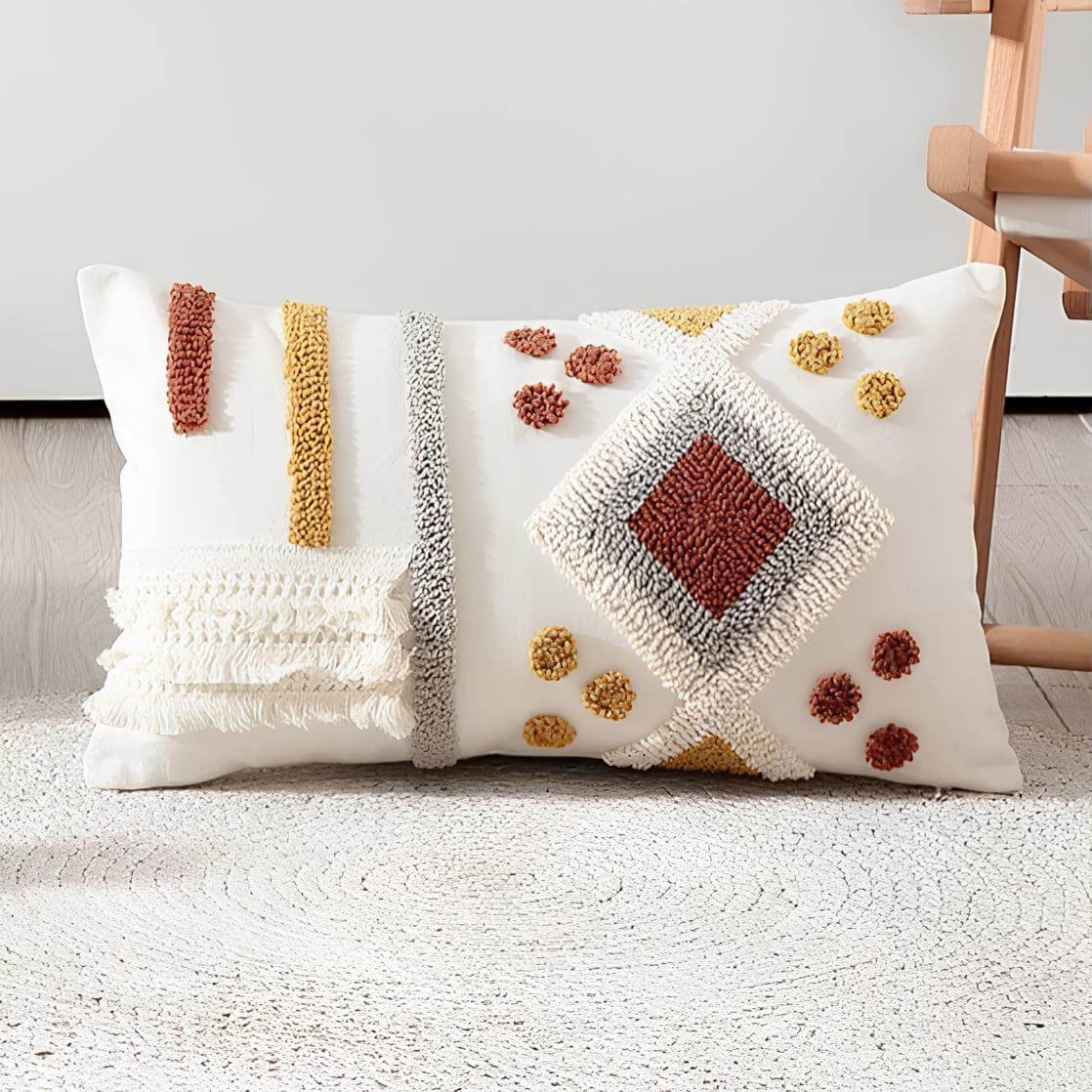 Coussin bohème tufté géométrique