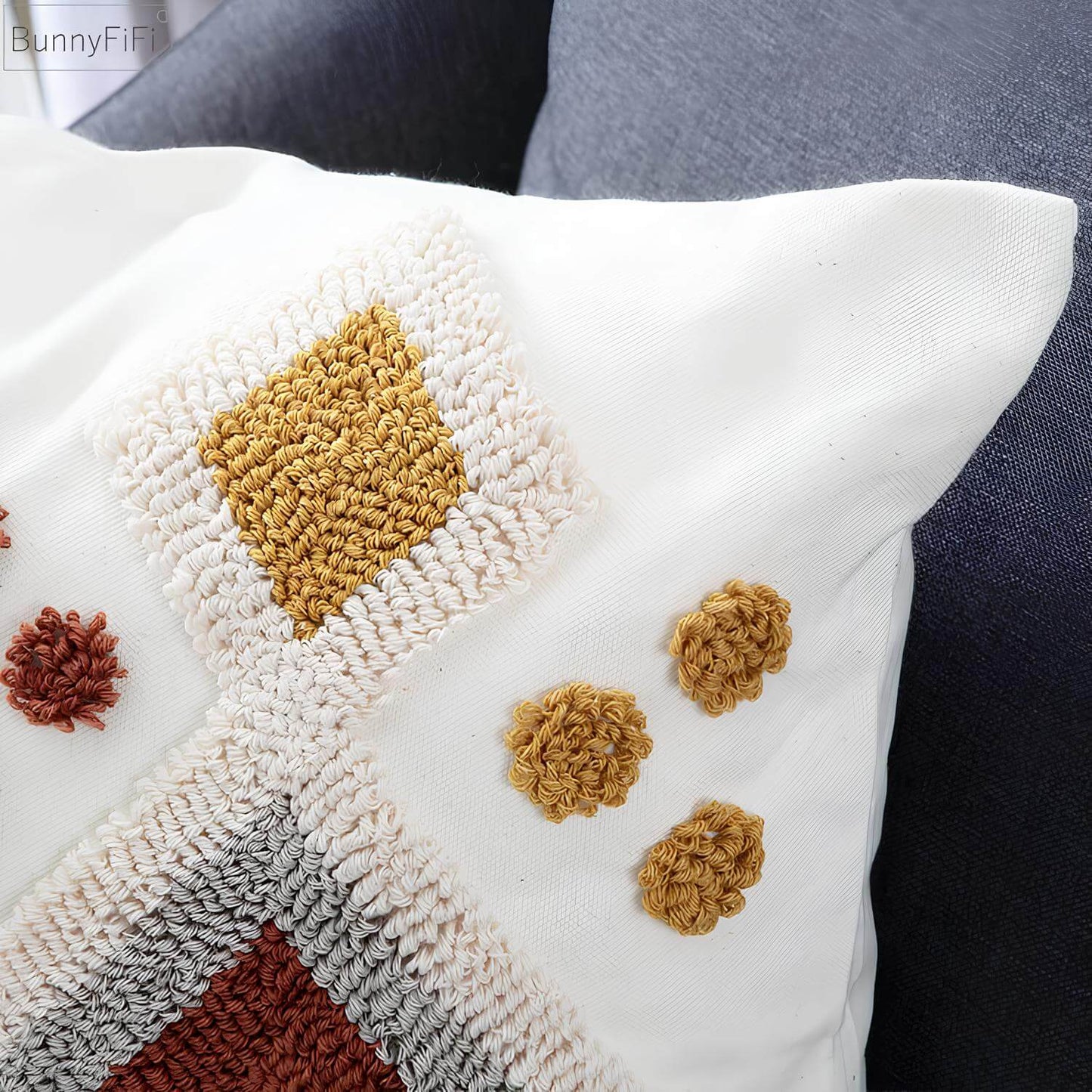 Coussin bohème tufté géométrique