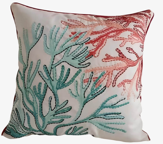 Coussin brodé corail