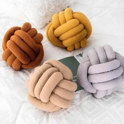 Coussin noeud boule