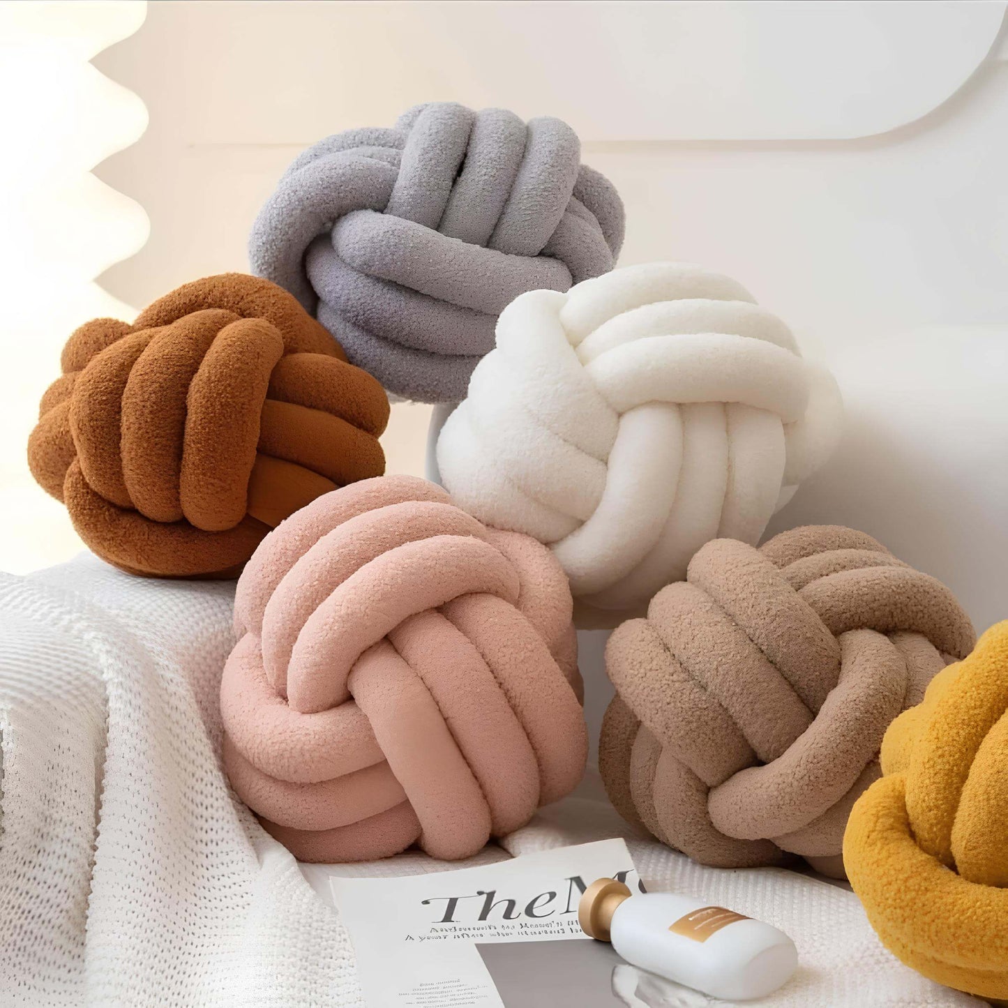Coussin noeud boule