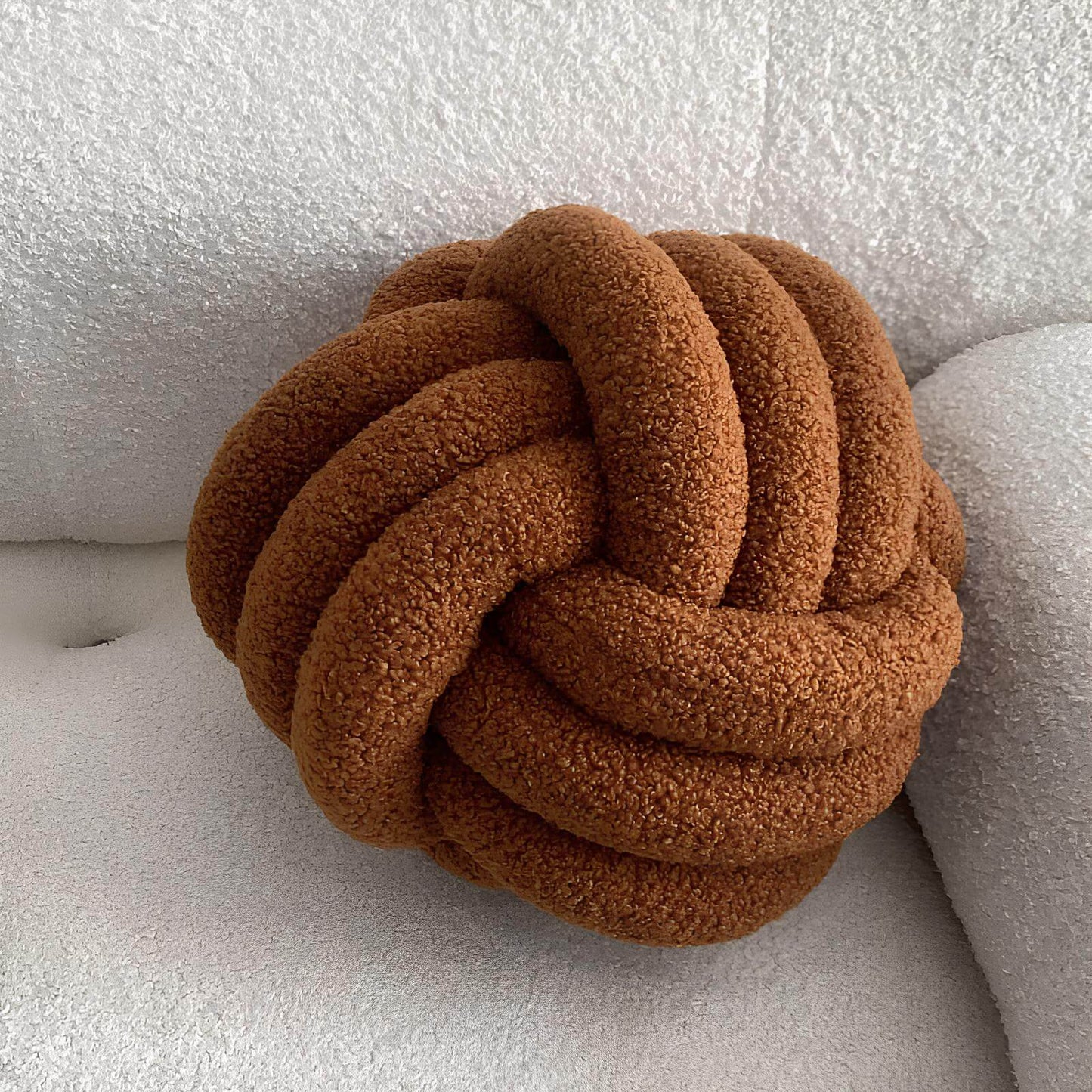 Coussin noeud boule