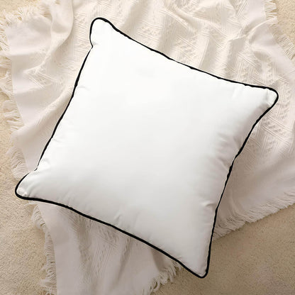 Coussin noir et blanc en velours