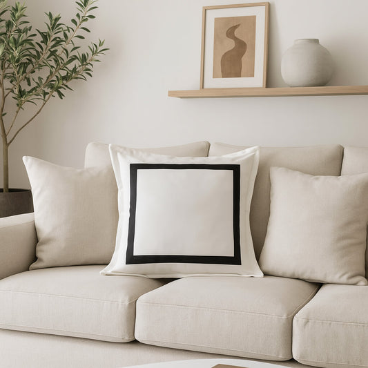 Coussin noir et blanc motif géométrique